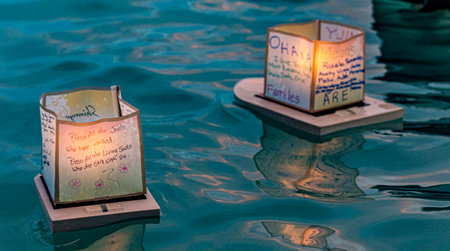hawaii, honolulu - 20230530: Shinnyo Floating Lantern Festival - lanterns have wishes written on them for their dear departed dead.のeditorial素材