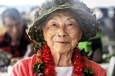 Honolulu, Hawaii/USA - 2022-08-20 - Shaka Filming Hukilau - Oldest member of the event recalls her first Hukilau as a child.のeditorial素材