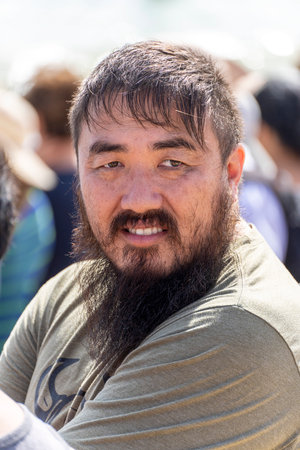 Honolulu, Hawaii/USA - 2022-08-20 - Shaka Filming Hukilau - face portrait of organizer of the free event.のeditorial素材