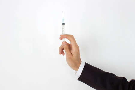 man hand hold Syringe の写真素材