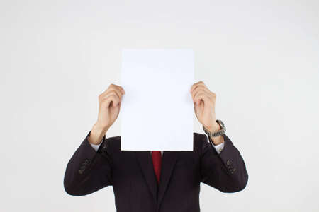 men holding white paperの写真素材