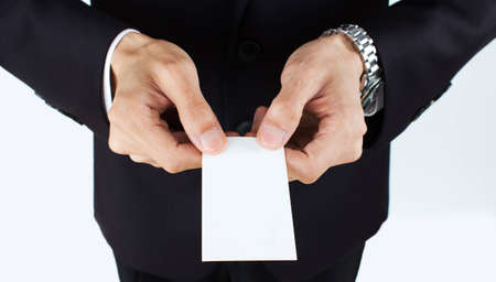 business man holding blank business card の写真素材