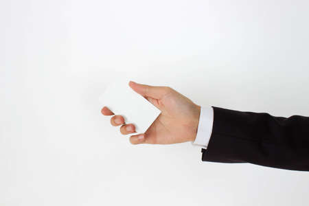 business man holding blank business card の写真素材