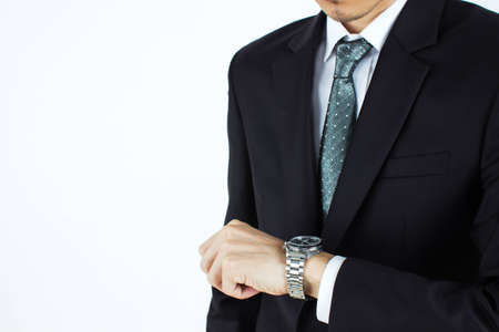 Businessman looking at his watchの写真素材