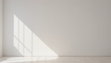 Sunlit wall with shadows and a wooden floor. Premium background for banners, posters or mockups.の写真素材