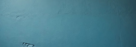 Unique blue plaster wall texture in focus. Vintage photo with rustic wall theme for website banner, poster and wallpaper.の写真素材