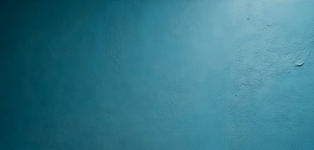 Vibrant blue wall texture captured in detail. Vintage photo with rustic wall theme for website banner, poster and wallpaper.の写真素材