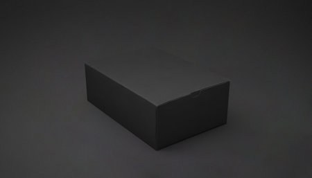 A simple black box on a solid dark background. Premium photo mockup for elegant and clean cardboard...