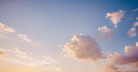 Picturesque sunset sky with soft pink and blue hues and fluffy white clouds. Background photos for...