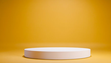 Simple image showing a white cylindrical platform on a yellow background suitable for product display or presentations.の写真素材