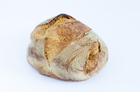 Loaf of bread on white background. Top view.の写真素材