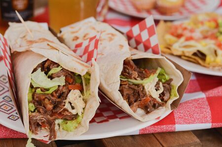 Burritos stuffed with meat and vegetables. Picnic lunch.の写真素材