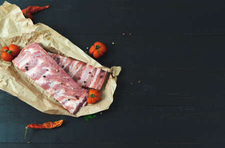 Pork ribs on a dark background. Copy space.の写真素材