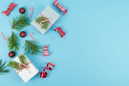 Various Christmas decorations on a blue background. Copy space.