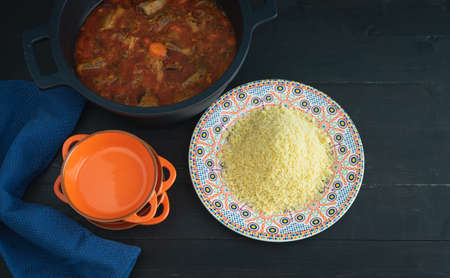 Ramadan meal. Lamb with couscous. Arabic cuisine. Copy space. Top view.
