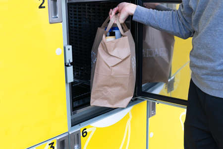 Buy online. Pick up your groceries at the supermarket's lockers. Social distance. Copy space.の写真素材