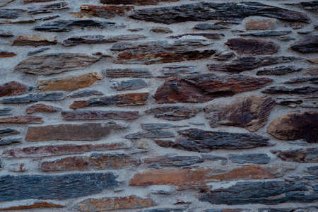 Texture of stone wall with cement. Stone backgrounds with gray cement.