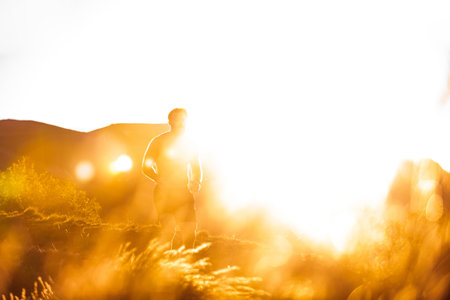 Athletic young man running in the nature. Healthy lifestyleの写真素材