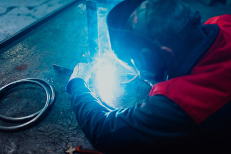 Close up of the steel welding process. Work in the heavy steel industryの写真素材