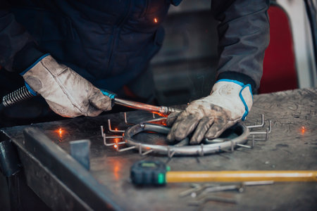 Close up of the steel welding process. Work in the heavy steel industryの写真素材