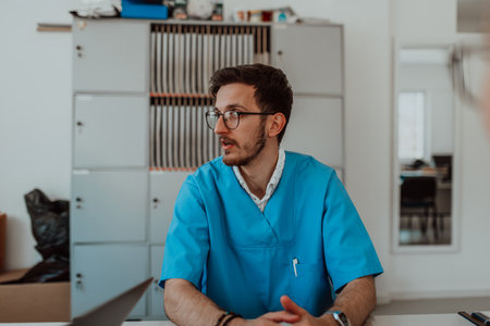 A doctor leading a meeting of the medical team in a modern medical room, fostering collaboration, communication, and effective decision-making to provide patient-centered care in a dynamic and innovative healthcare settingの写真素材