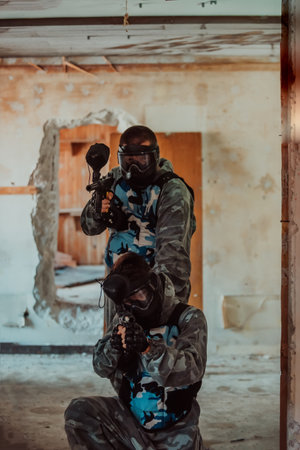 Photo of a paintball team in action with professional equipment.Selective focusの写真素材