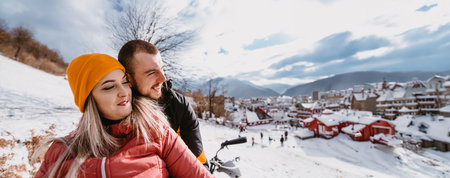 A young adventurous couple embraces the joy of love and thrill as they ride an ATV Quad through the...