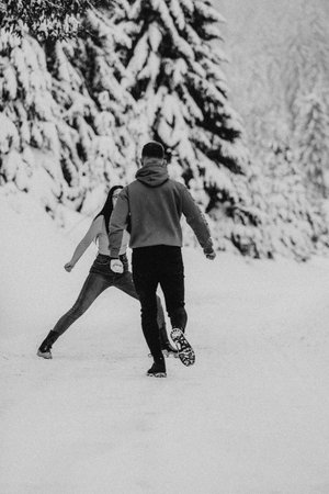 On a snowy Valentines Day, this romantic couple shares warmth, laughter, and tender embraces,...