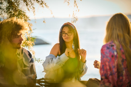 Group of friends having fun on the beach