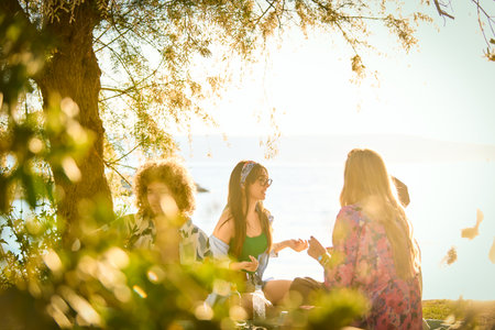 Group of friends having fun on the beachの写真素材