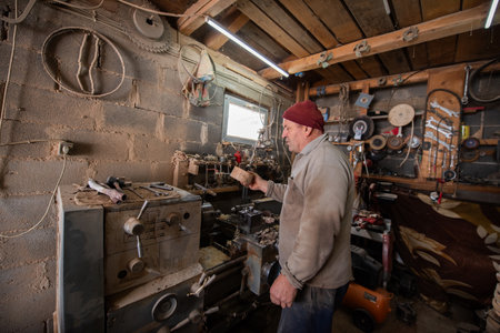 Elderly Craftsman Working in a Rustic Workshop