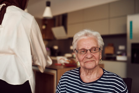 Unfiltered portrait, a real elderly woman sits gracefully in a chair, showcasing the authenticity of aging with wrinkles and a natural faceの写真素材