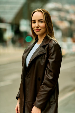 A Casual Girl Poses with Confidence and Style on Urban Streets