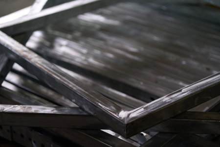 Metal Frame Structures Stacked In Industrial Setting Construction Mateの写真素材