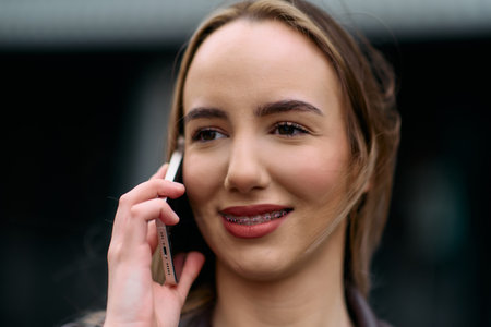 Business Woman With Phone Near Office. Portrait Of Beautiful Smiling Female In Fashion Office...