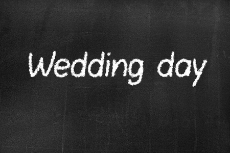 Blackboard with the text 'Wedding day' background textureの写真素材
