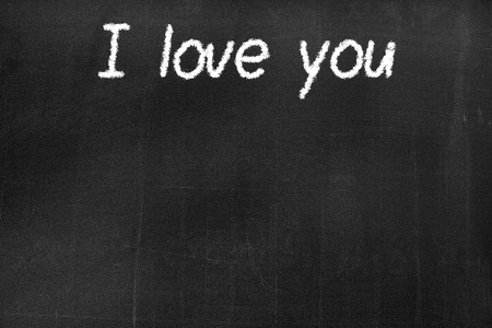 Blackboard with the text 'I love you' background textureの写真素材