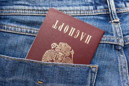 Russian passport in the back jeans pocket close-upの写真素材