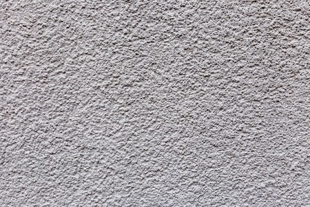 Texture gray plastered wall for background. Gray textured painted wall