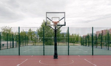 Outdoor basketball court in a public park. Playground for basketball.の写真素材