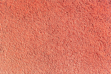 Texture red plastered wall for background. Gray textured painted wall