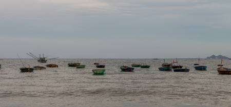 Picturesque seascape with coracles on Danang Beach Jul 2016の写真素材