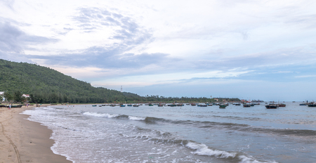 Picturesque seascape with coracles on Danang Beach Jul 2016の写真素材