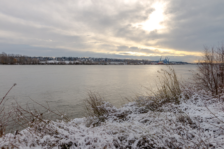 Snowing in a park near a bridge New Westminster, Vancouver Jan 2017の写真素材