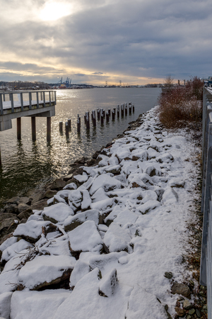Snowing in a park near a bridge New Westminster, Vancouver Jan 2017の写真素材