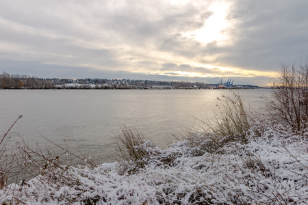Snowing in a park near a bridge New Westminster, Vancouver Jan 2017の写真素材