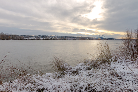 Snowing in a park near a bridge New Westminster, Vancouver Jan 2017の写真素材