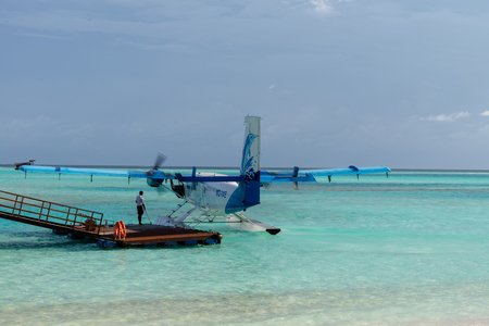 Niyama, Olhuveli island, Maldives - June 25th 2018 : Maldivian seaplane, floatplane comes into land
