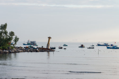 Picturesque seascape with coracles on Da Nang Beachのeditorial素材