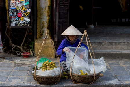 In the streets of Hoi An ancient town, Vietnam 2019のeditorial素材
